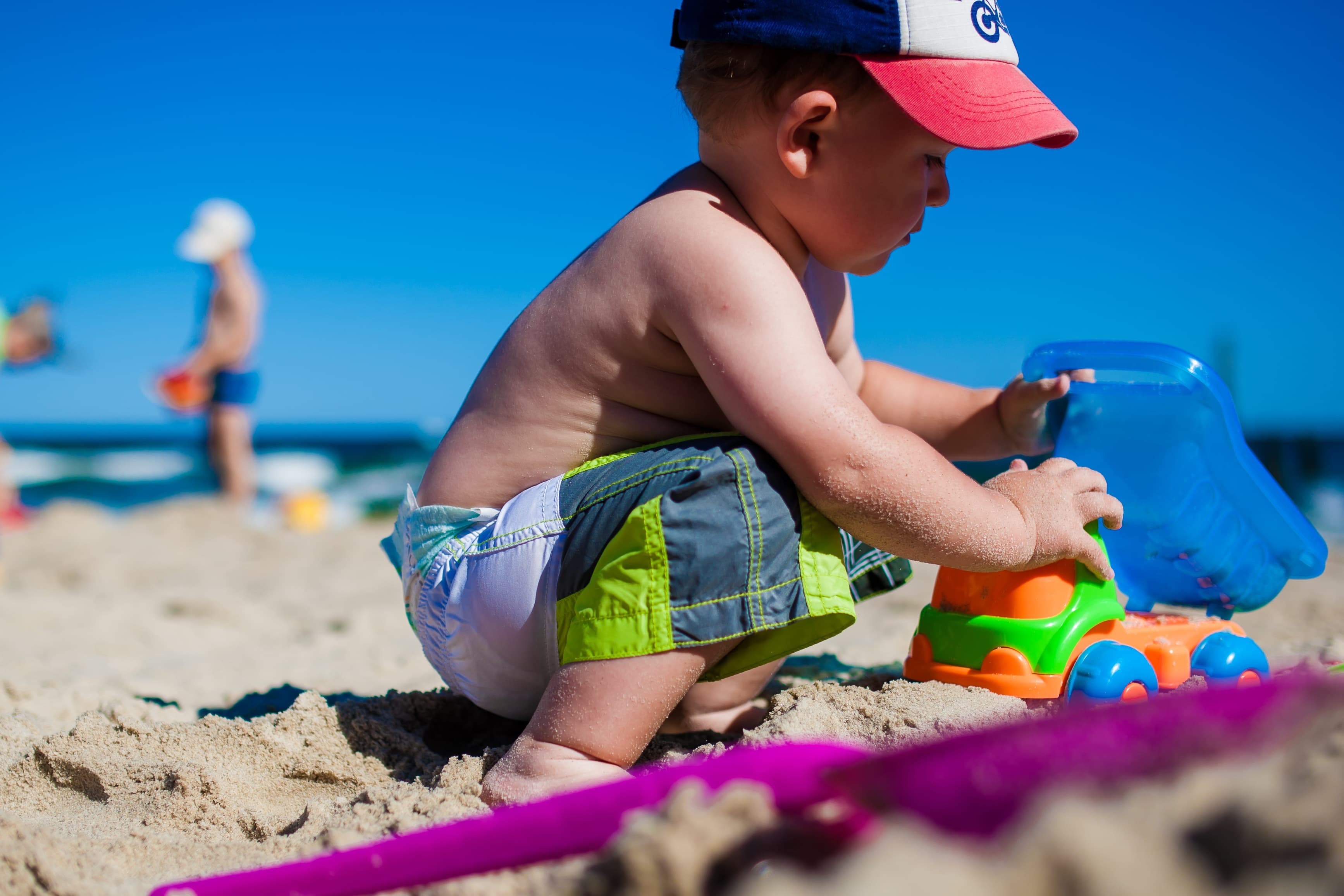 Baby playing on the beach
