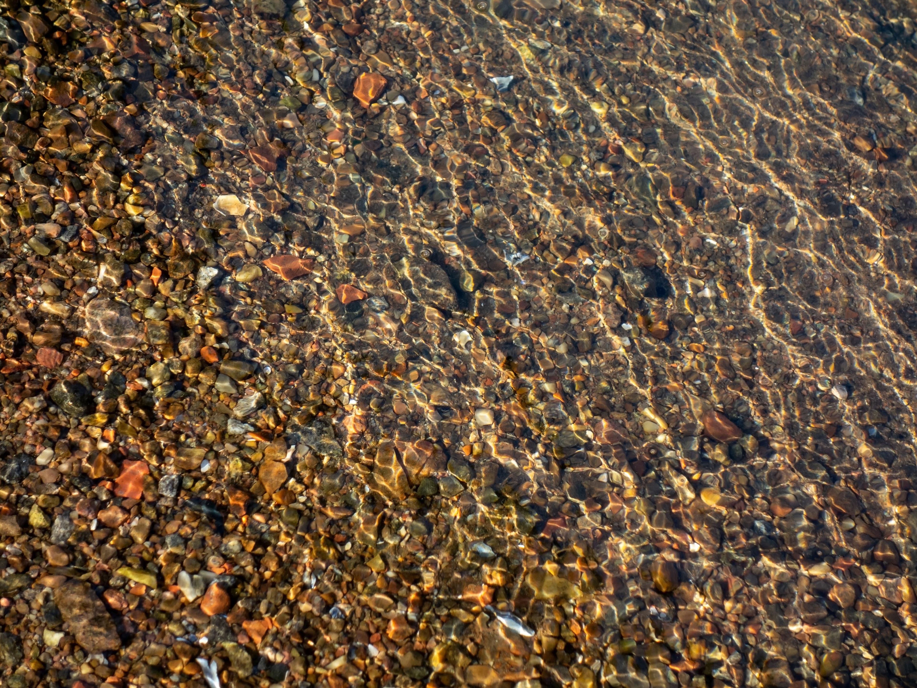 Granite gravel in shallow water 3