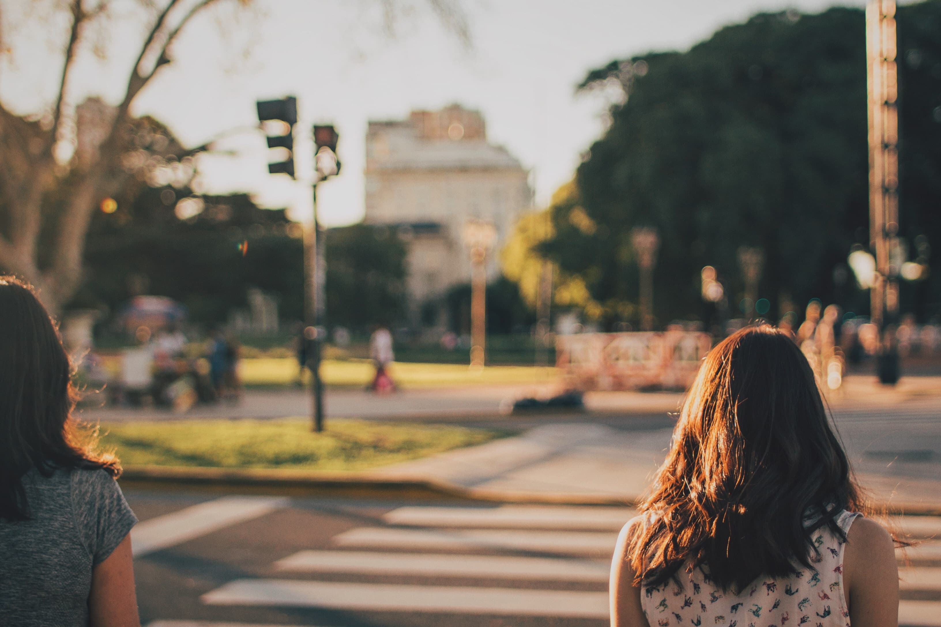 People at pedestrian crossing (Unsplash)