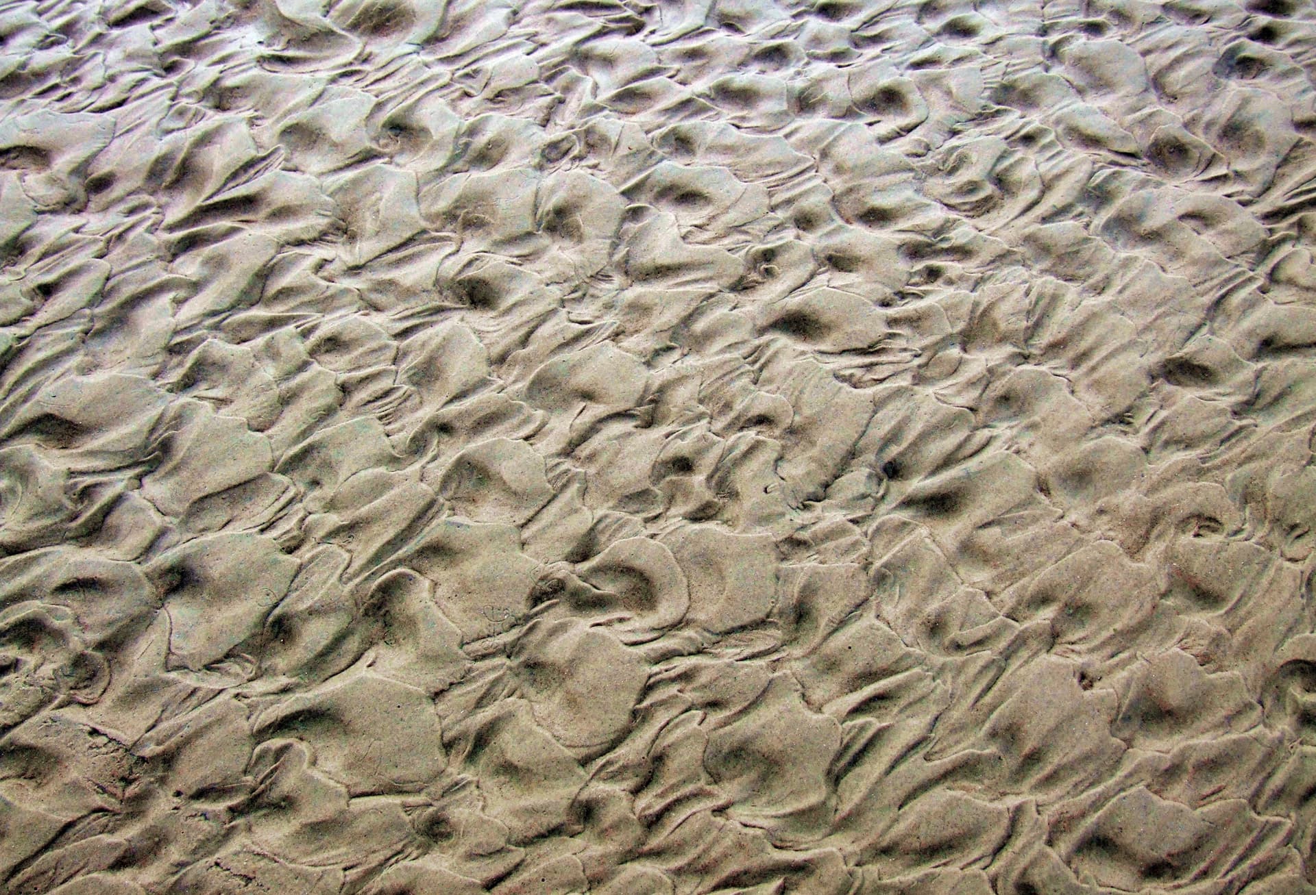 Traces of Water on Sand