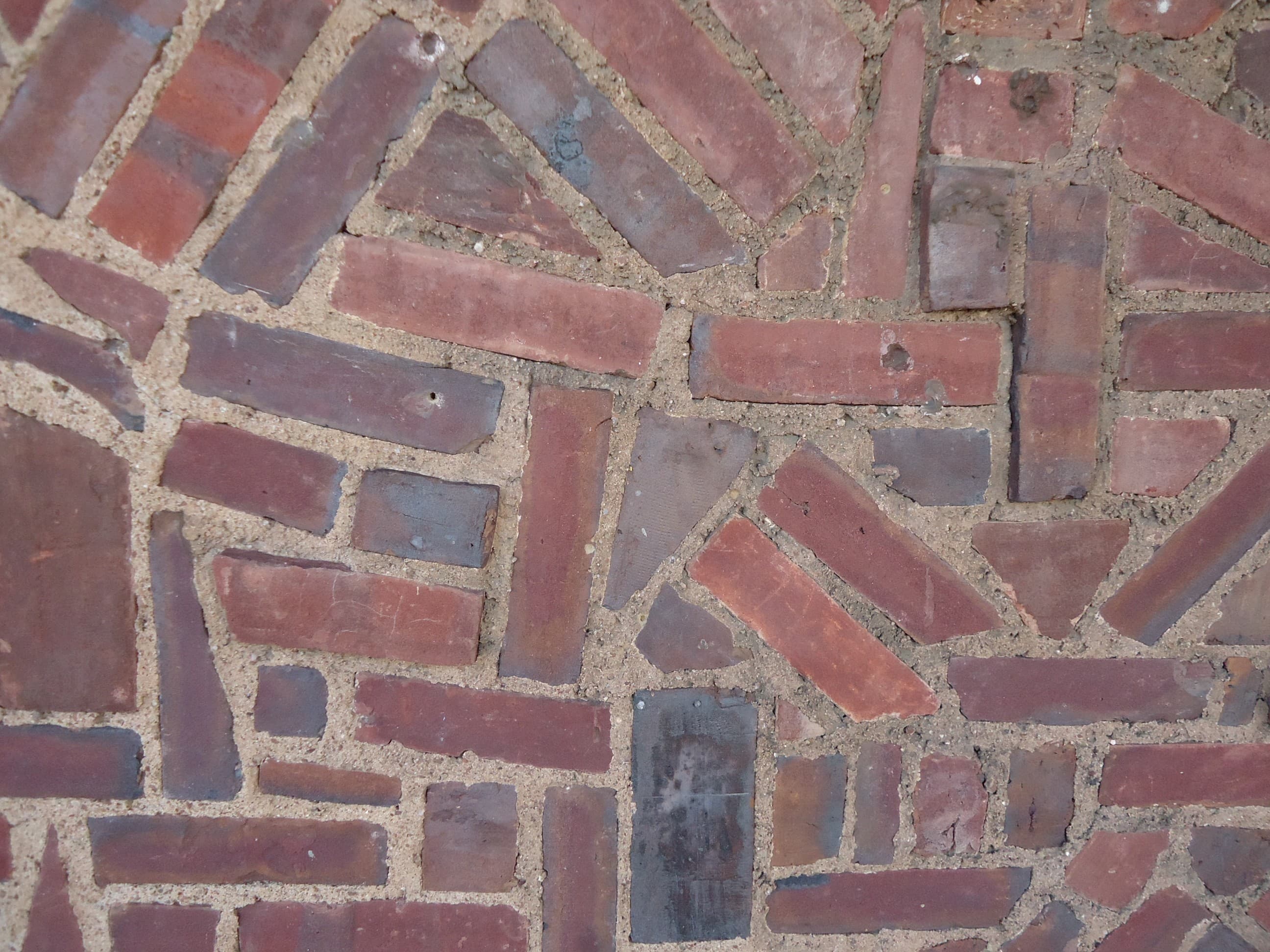 Surfaces brick wall with unstandard pattern