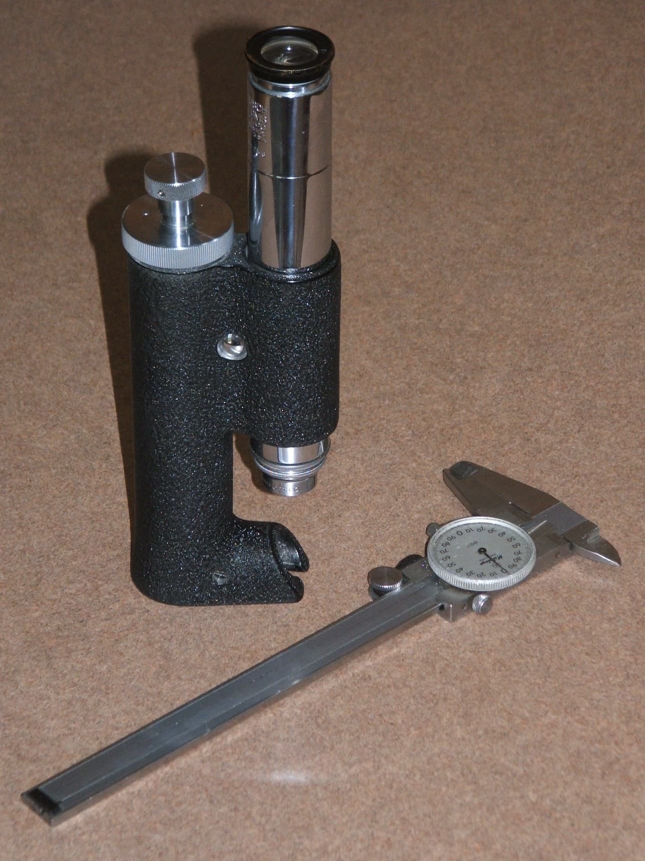 Measuring microscope and dial caliper