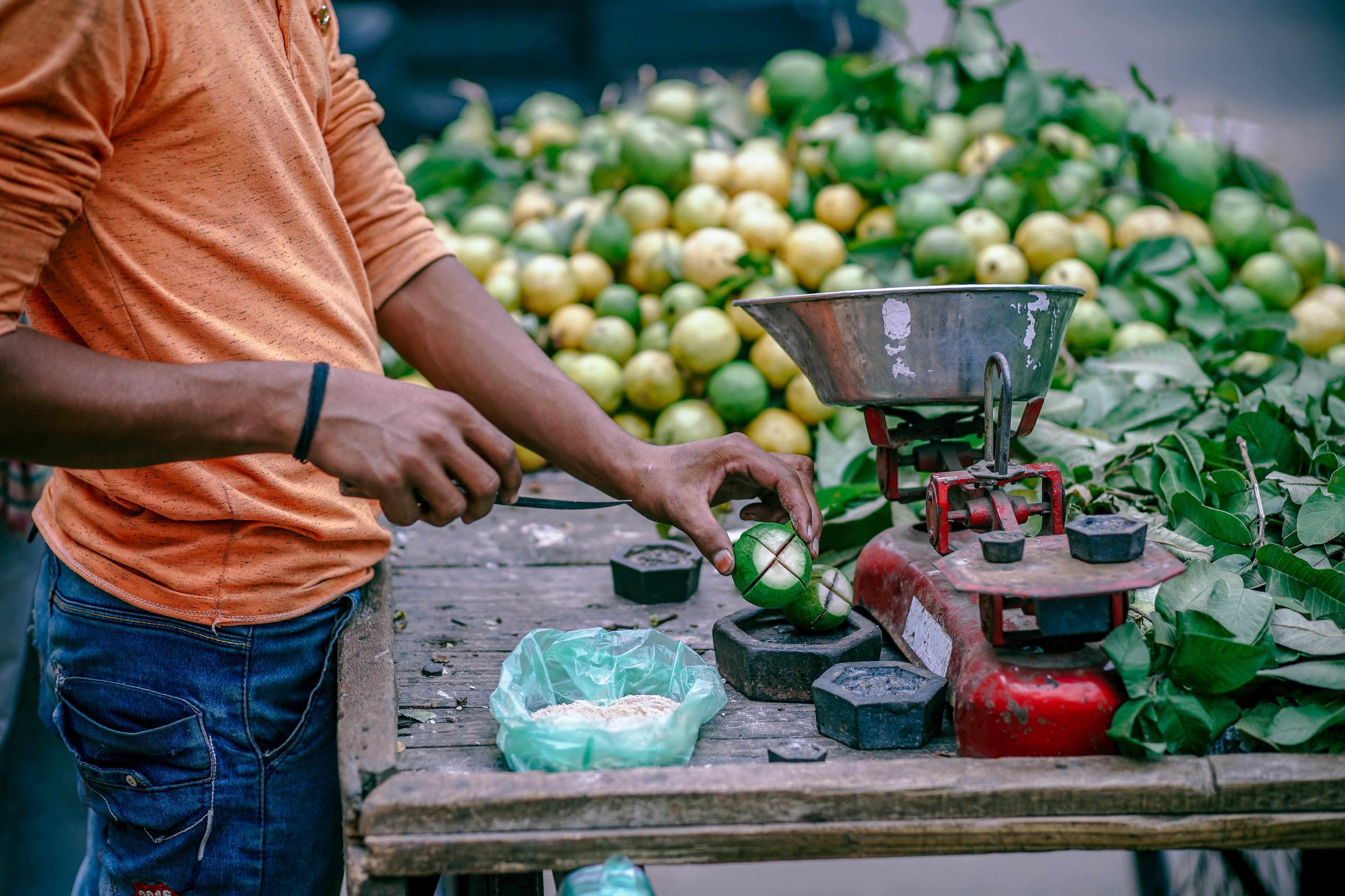 Street Fruit Seller at work (Unsplash)
