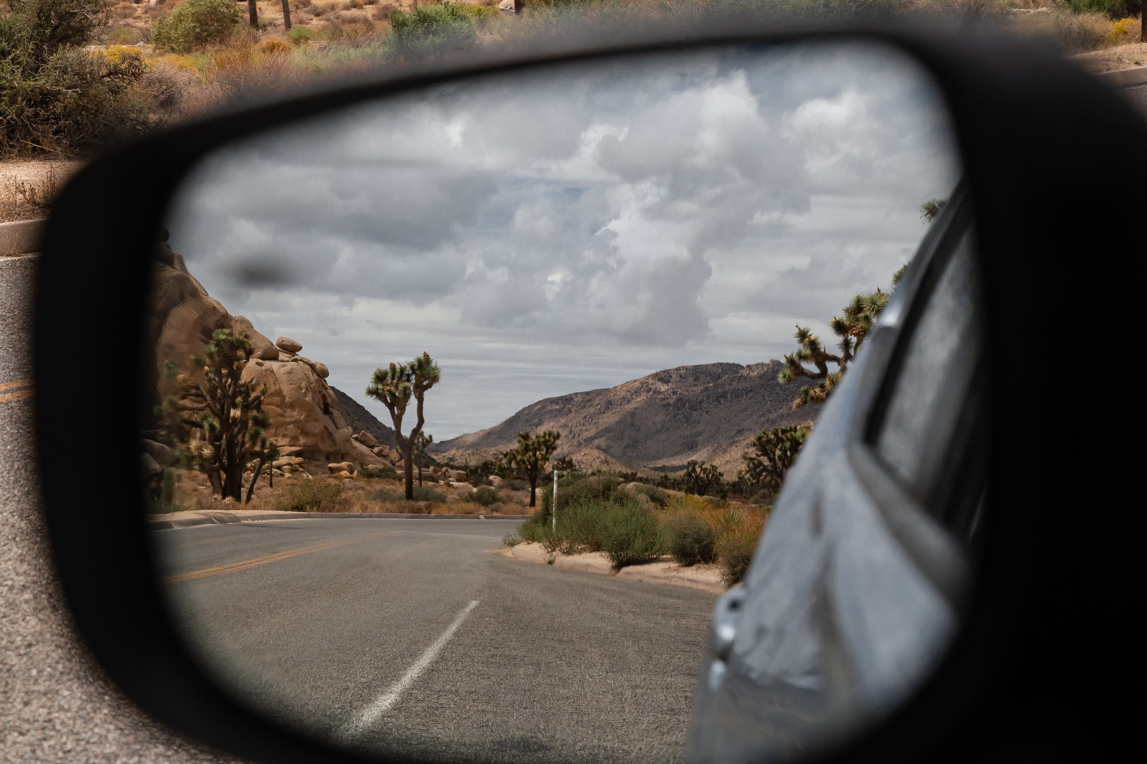 Storm clouds in mirror view (52353810984)