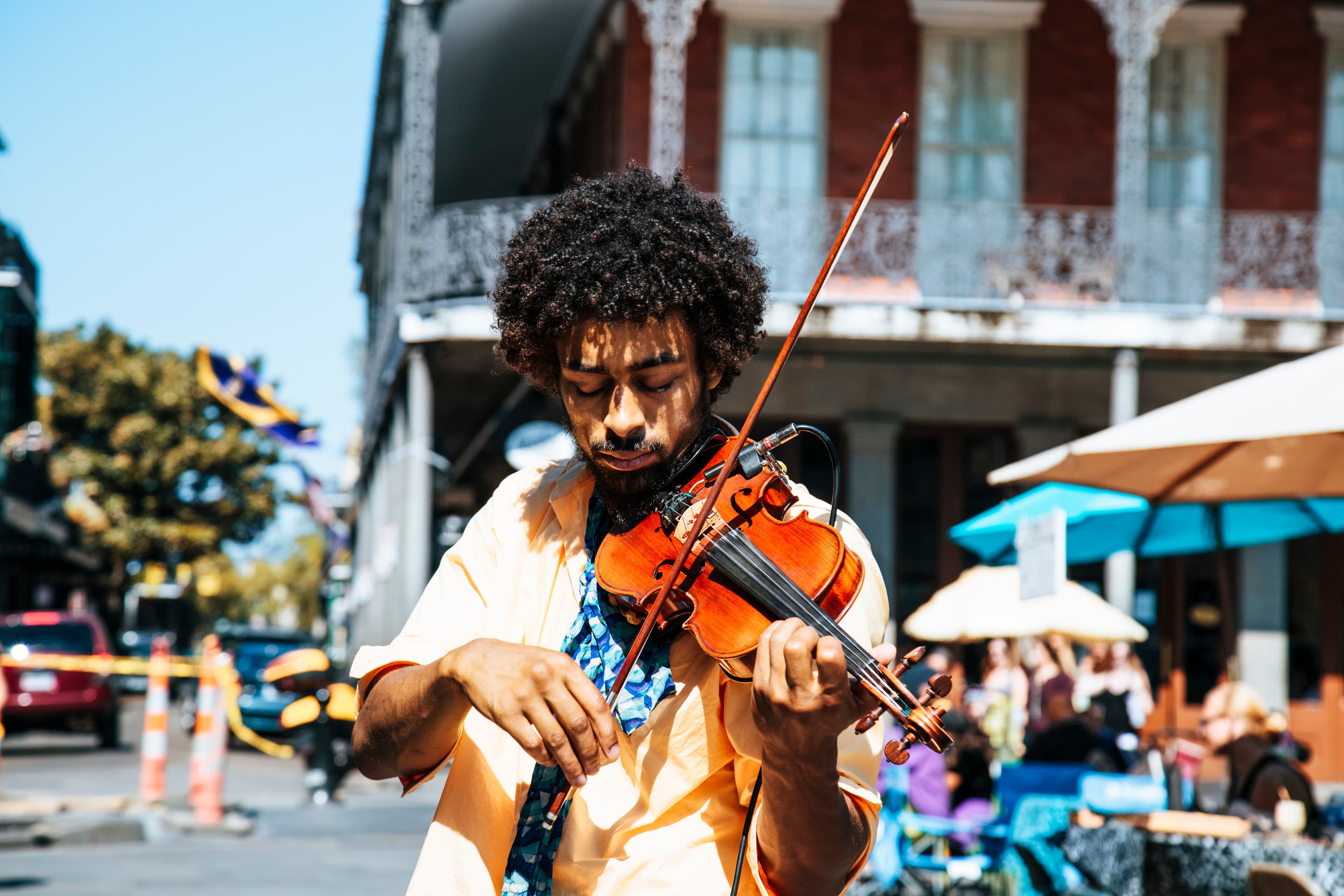 Musician Busking (Unsplash)