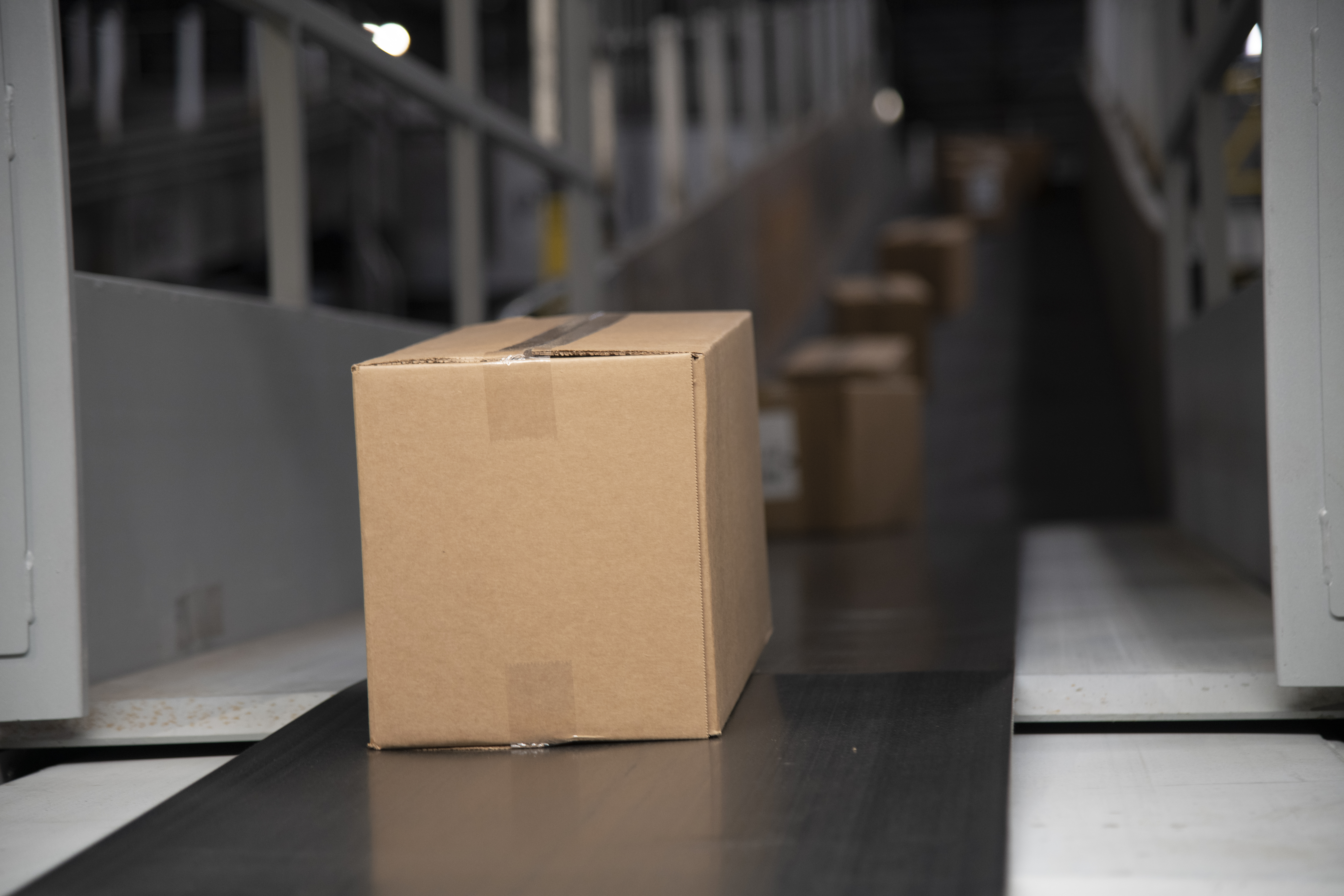 Packages on UPS conveyor belt