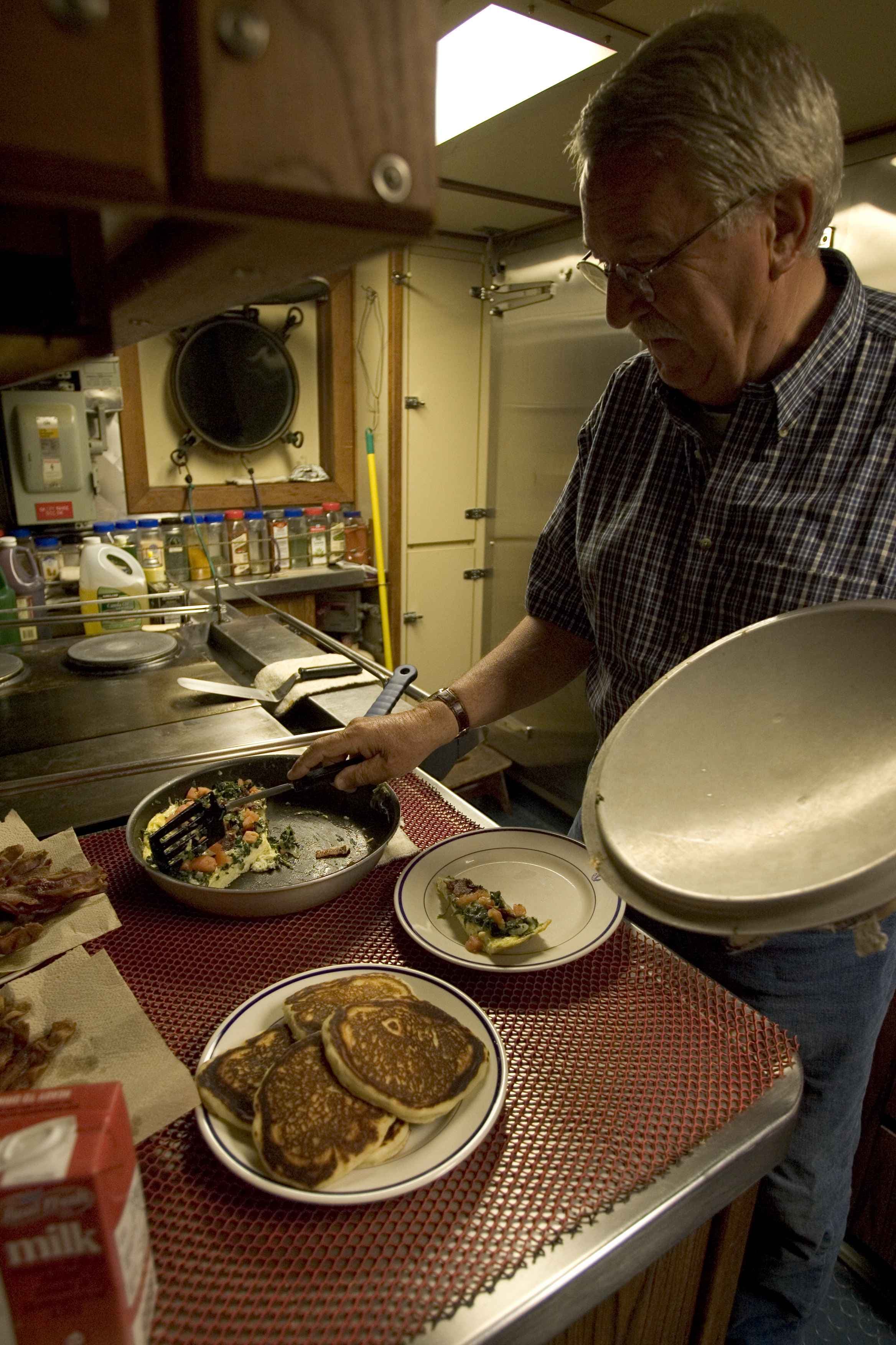 Chef prepares dinner in the kitchen