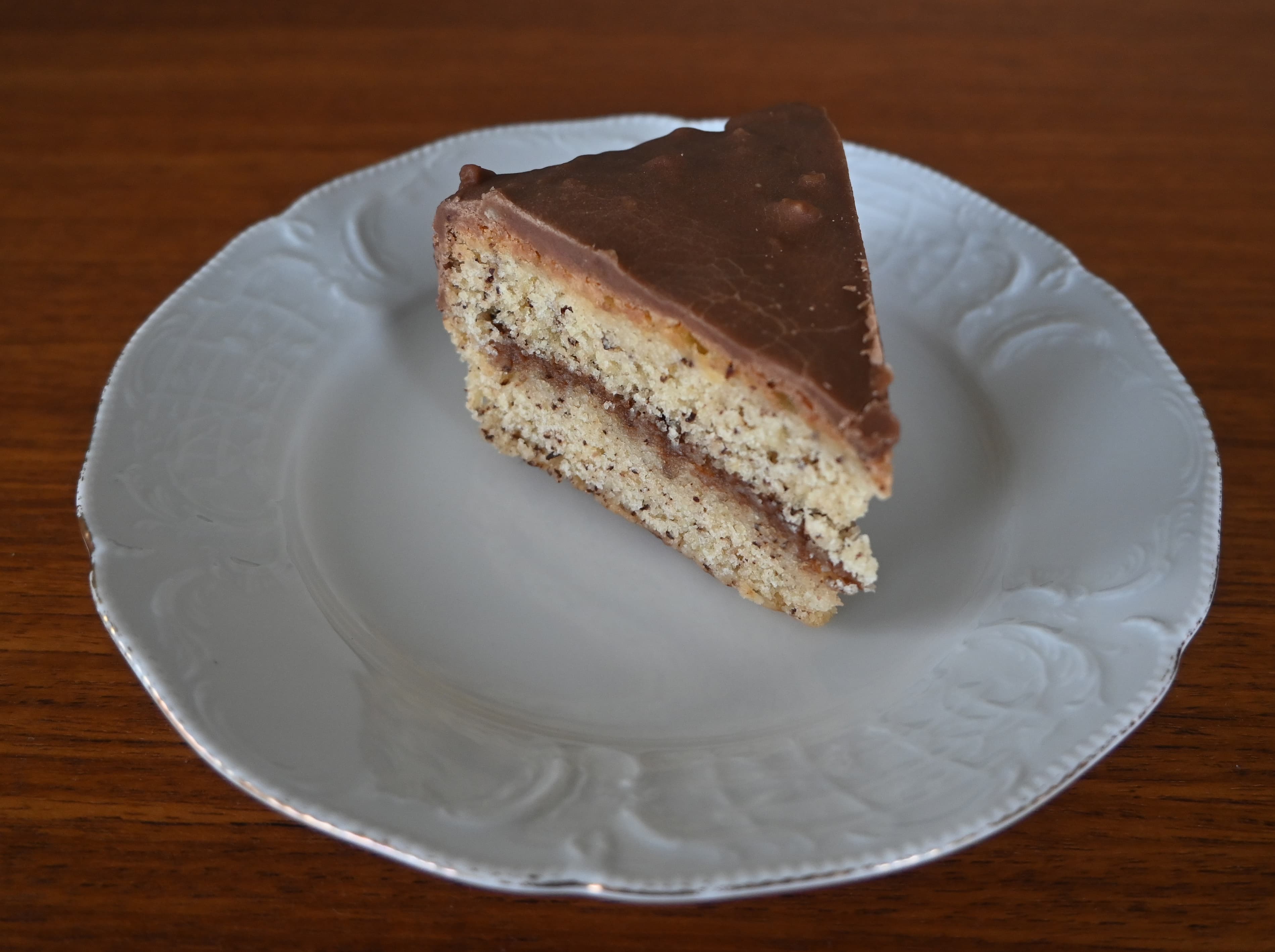 Chocolate cake on white plate