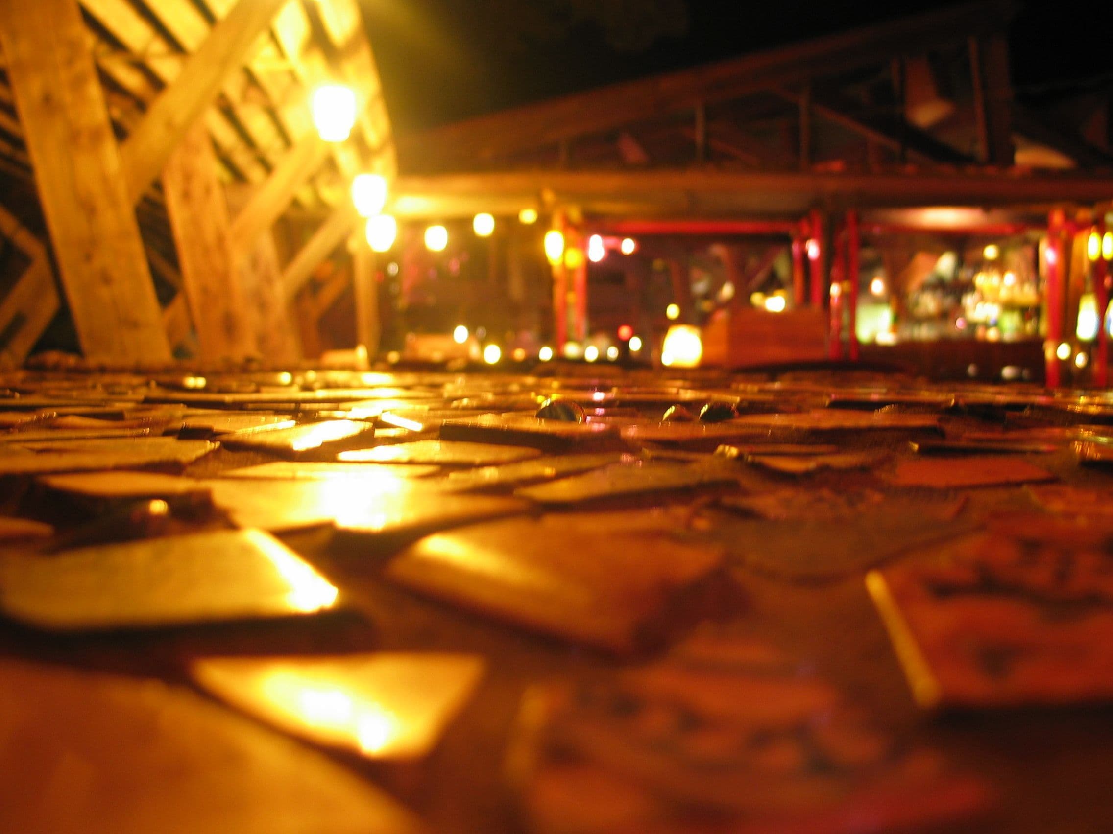 Nepenthe cobblestones reflecting street lights