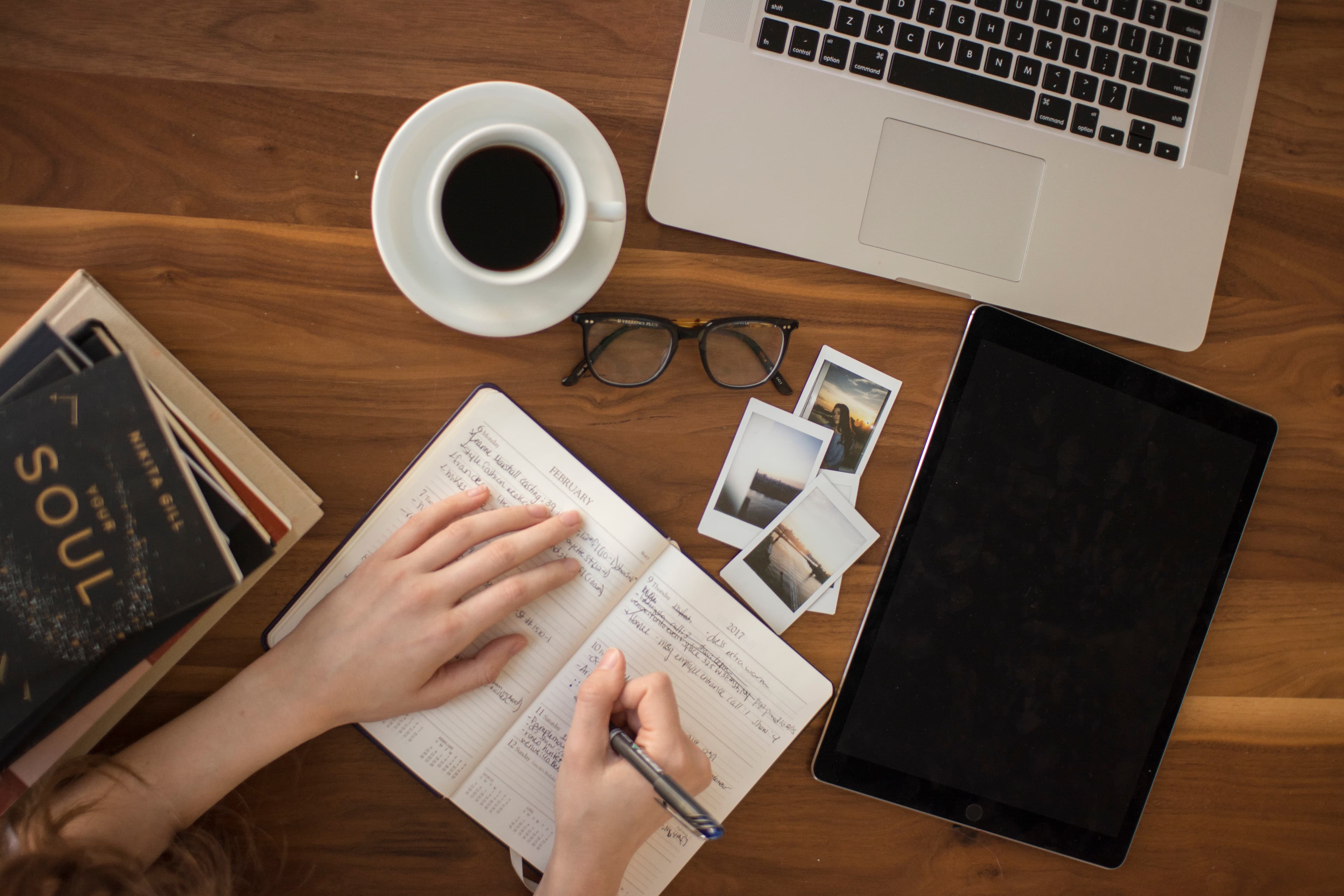 Journaling over coffee (Unsplash)