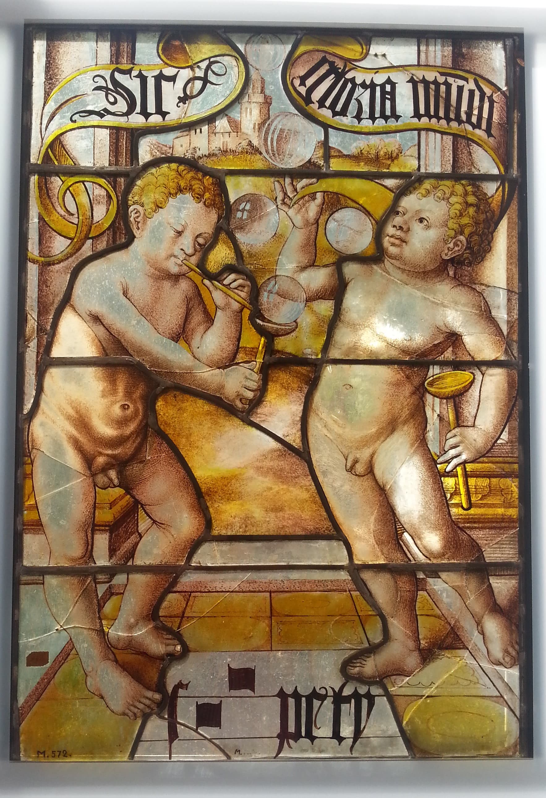 Boys blowing soap bubbles,