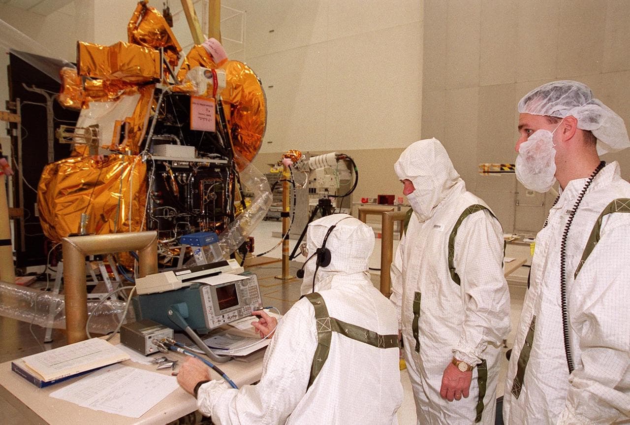 Workers, spacecraft, assembly