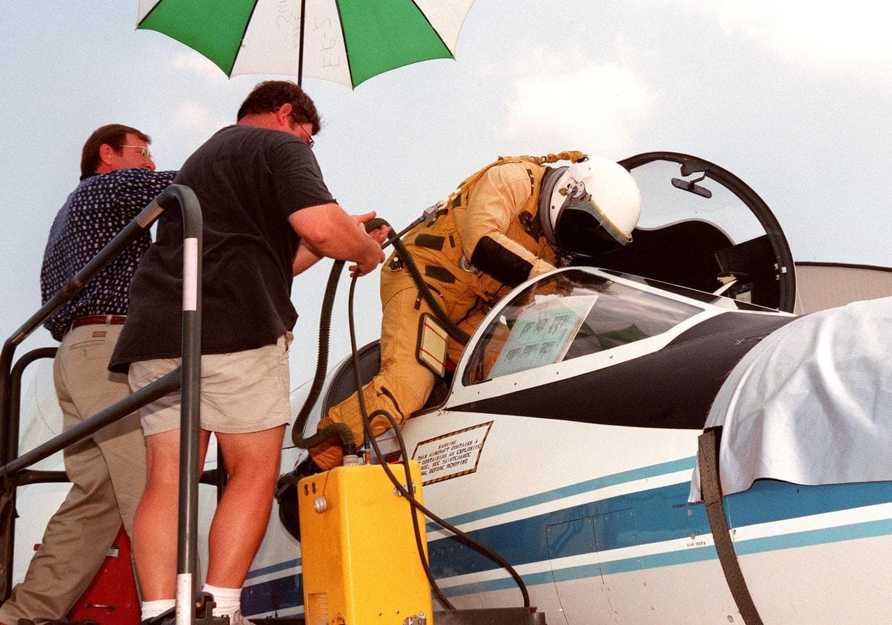 Pilot, climbs, cockpit