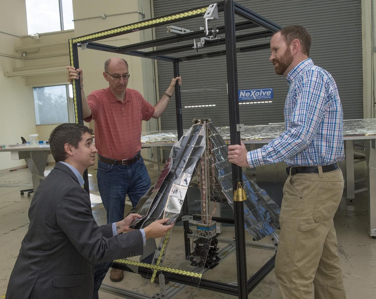 Lightweight integrated solar array and transceiver
