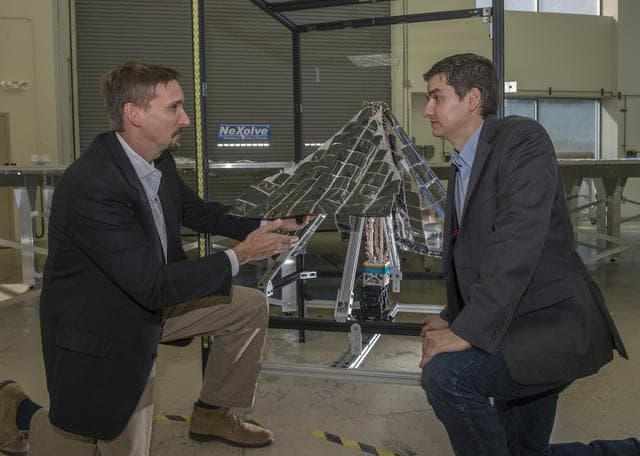 Lightweight integrated solar array and transceiver