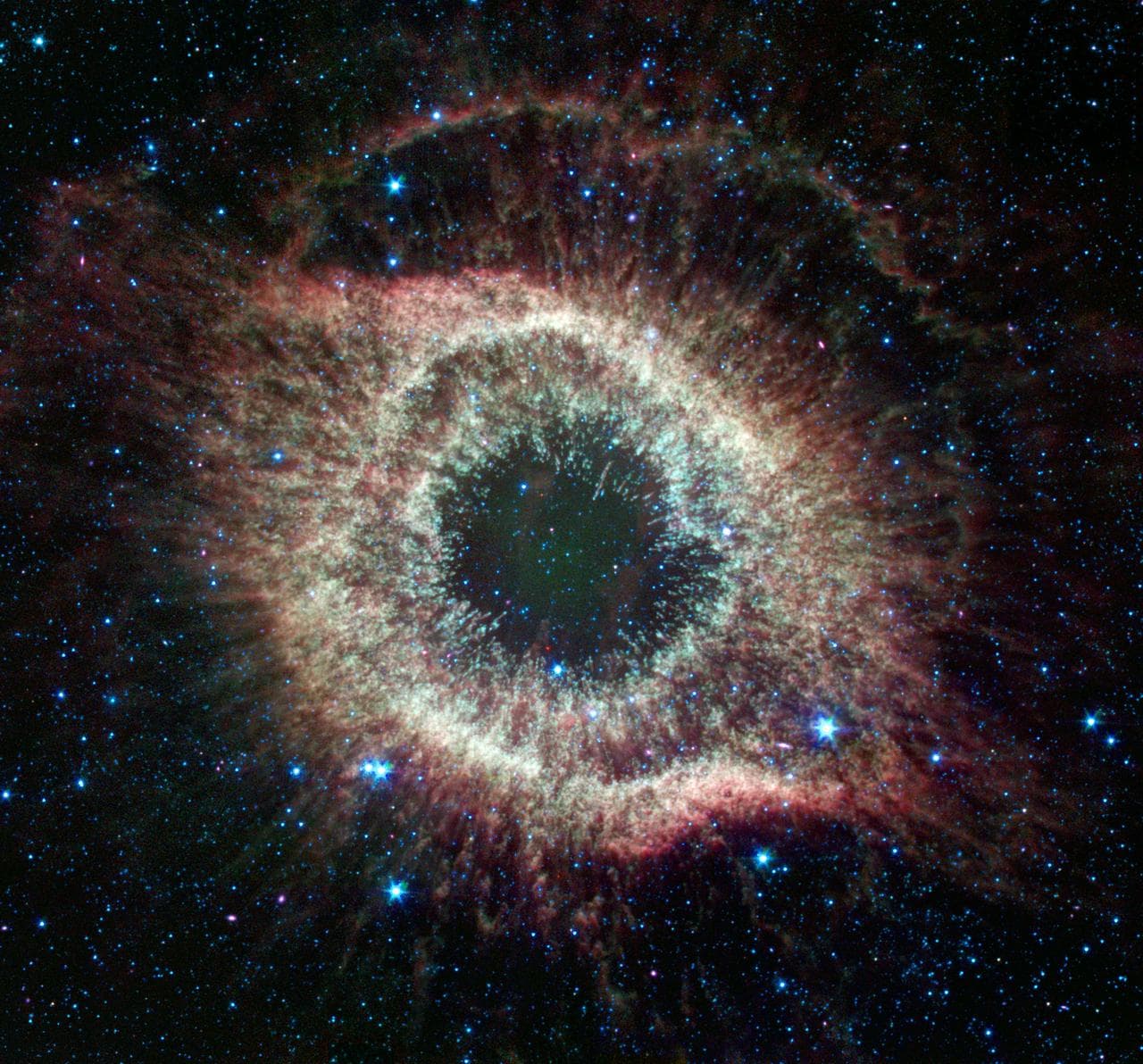 Spitzer Celebrates Fourth Anniversary with Celestial Fireworks