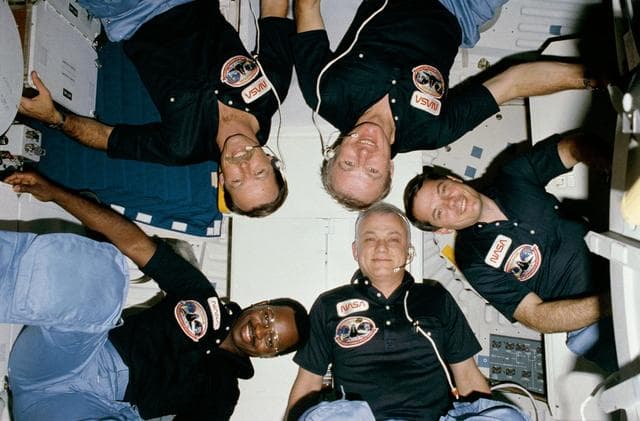 "Star Burst" style crew portrait of 41-B crew taken in-cabin