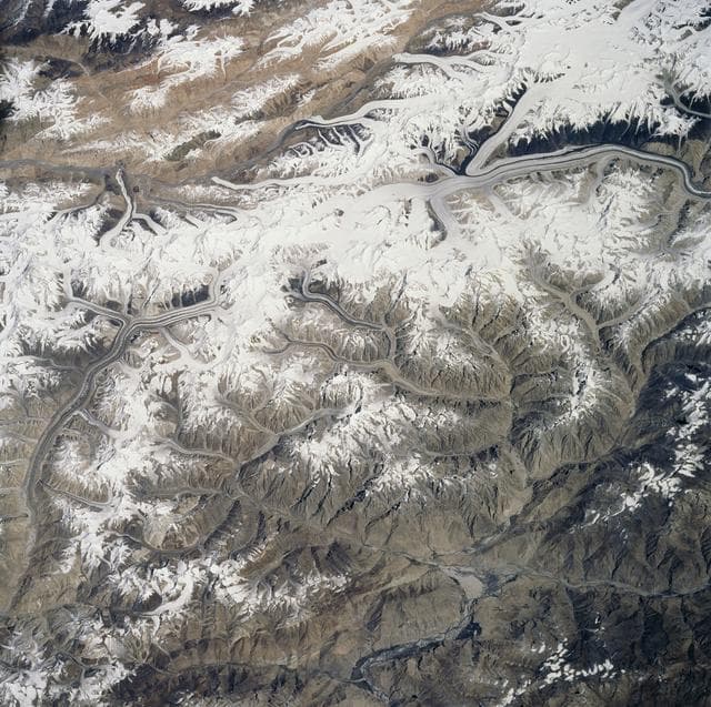 Glaciers in the Himalayan Mountains taken from Atlantis during STS-106