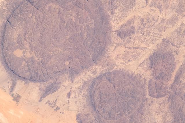 Near, circular, massifs