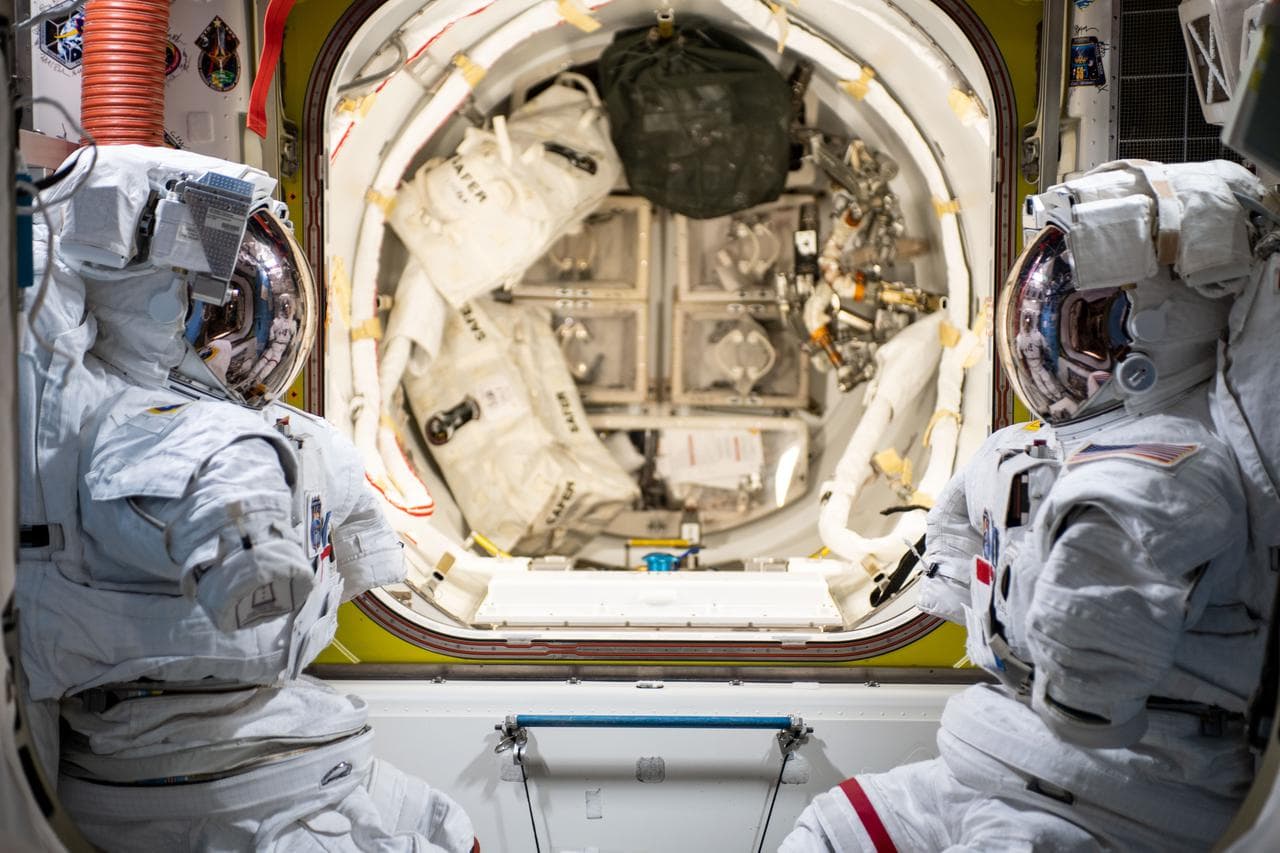 Pair, spacesuits, inside