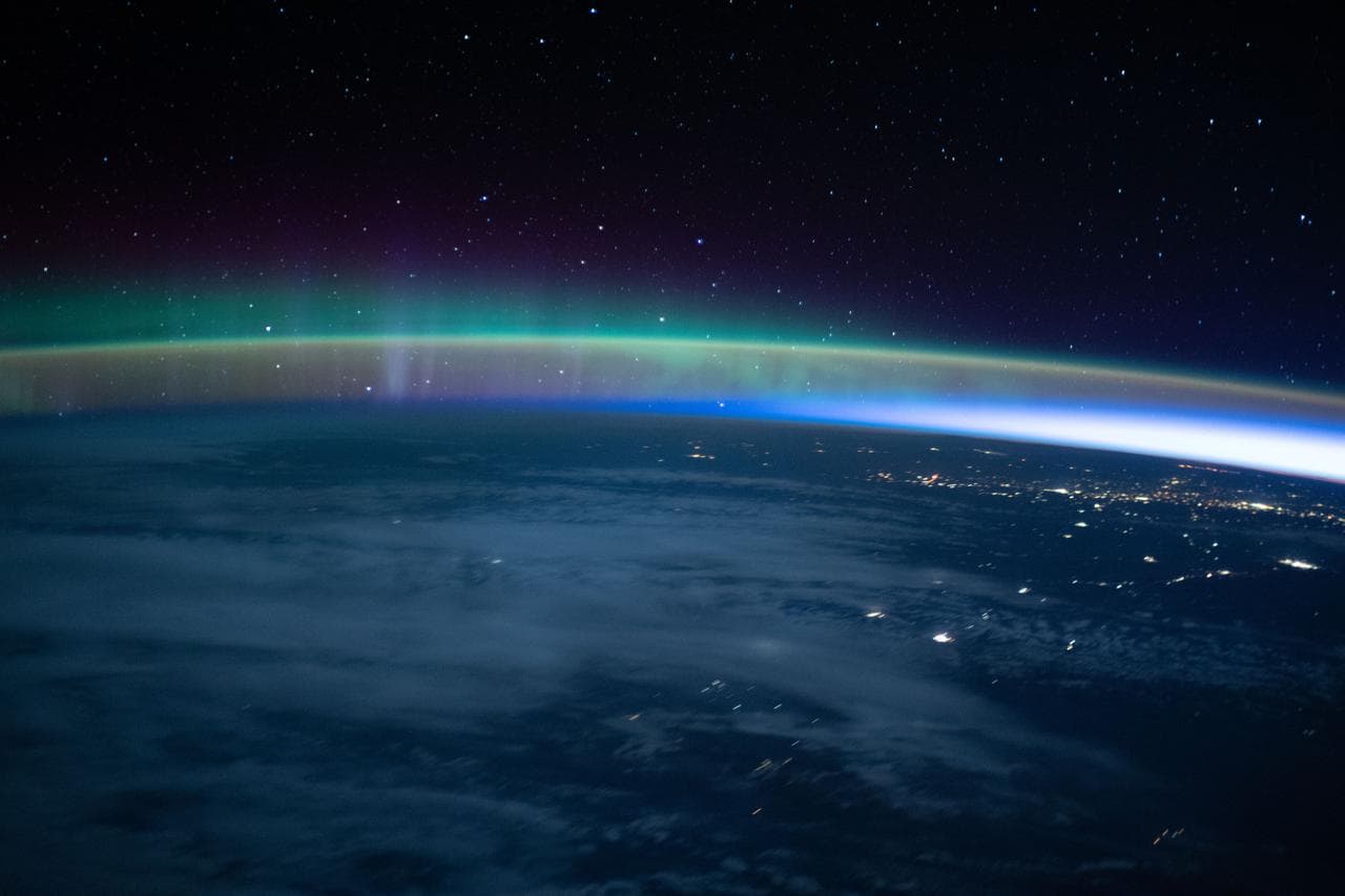 Aurora, dimly, intersects