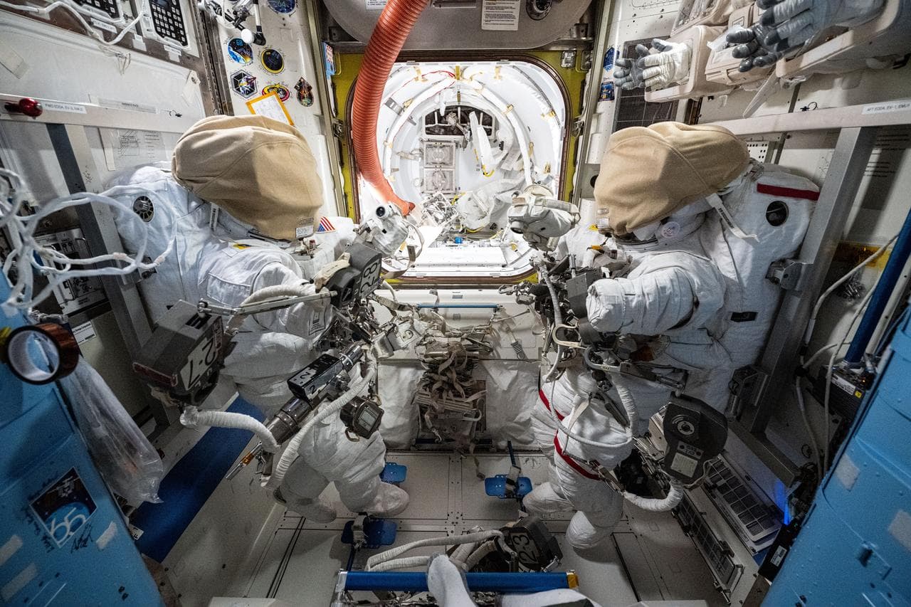 Spacesuits, staged, inside