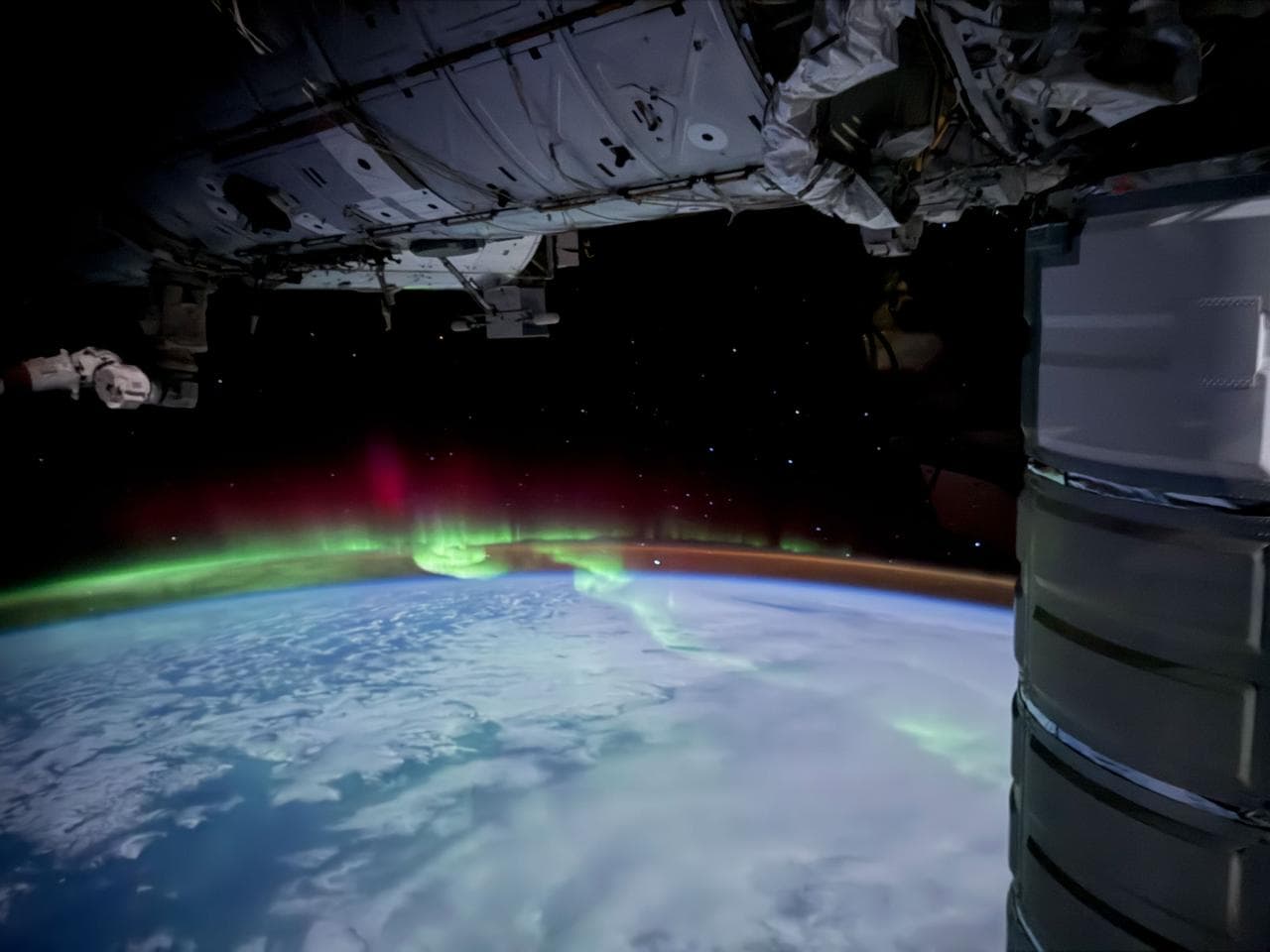 The aurora australis streams across the southern Indian Ocean