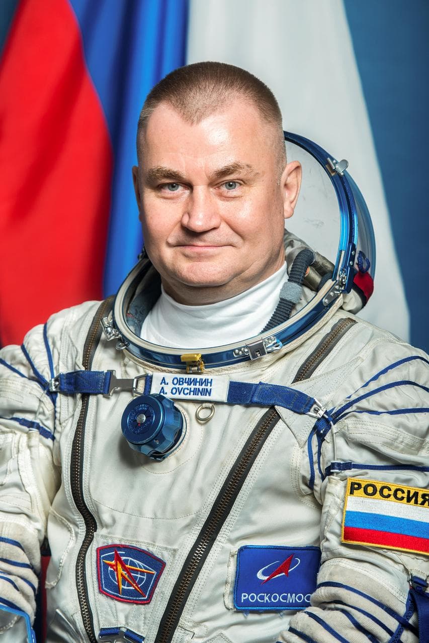 Soyuz MS-26 Commander Alexey Ovchinin poses for a crew portrait