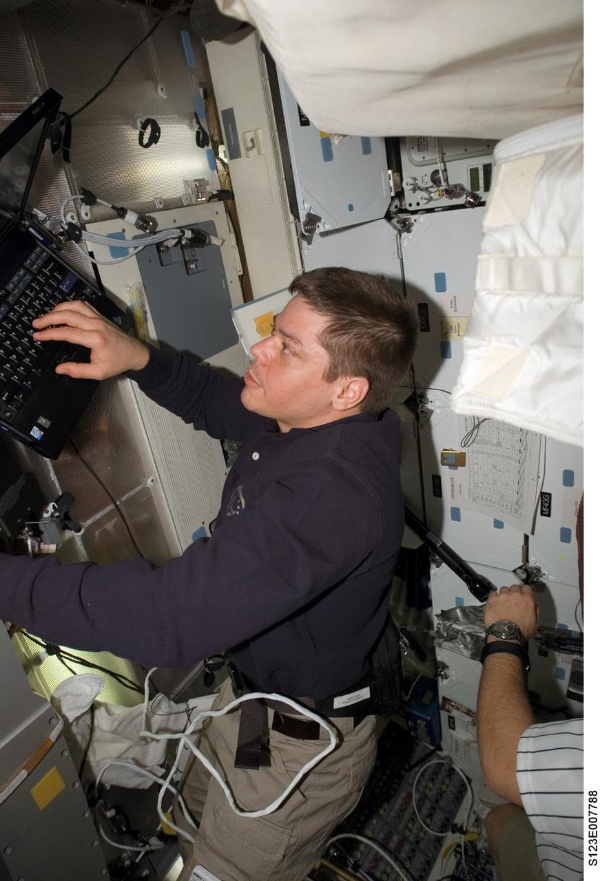 Behnken works on computer in the FWD MDDK during Joint Operations