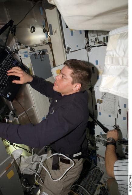 Behnken works on computer in the FWD MDDK during Joint Operations