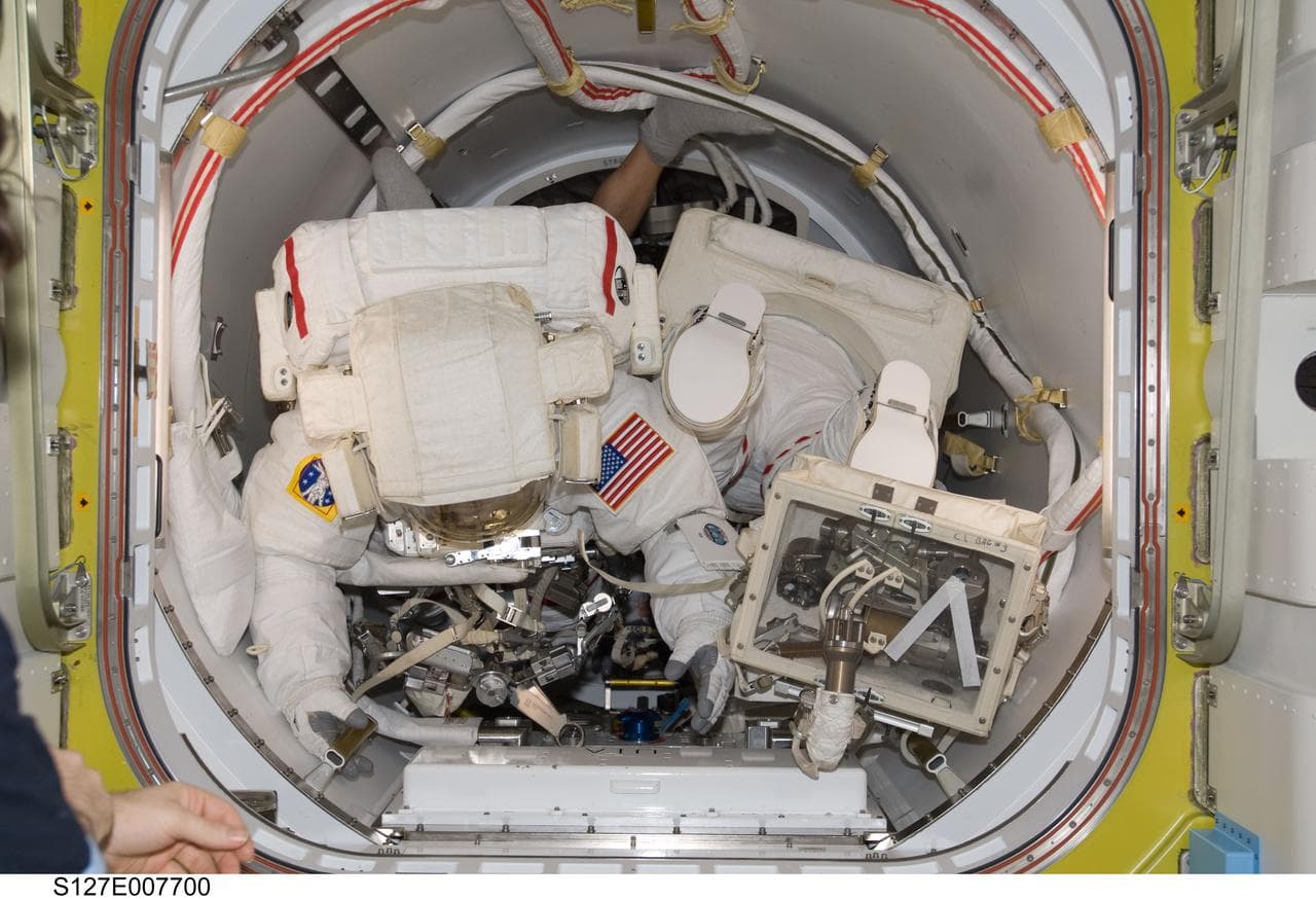 Wolf and Cassidy in the A/L during EVA-3 Preparation