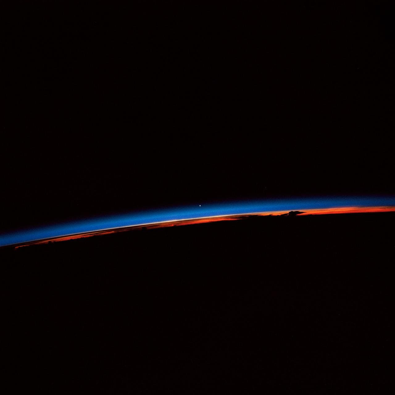 STS-30 sunset with Venus near the center of the frame