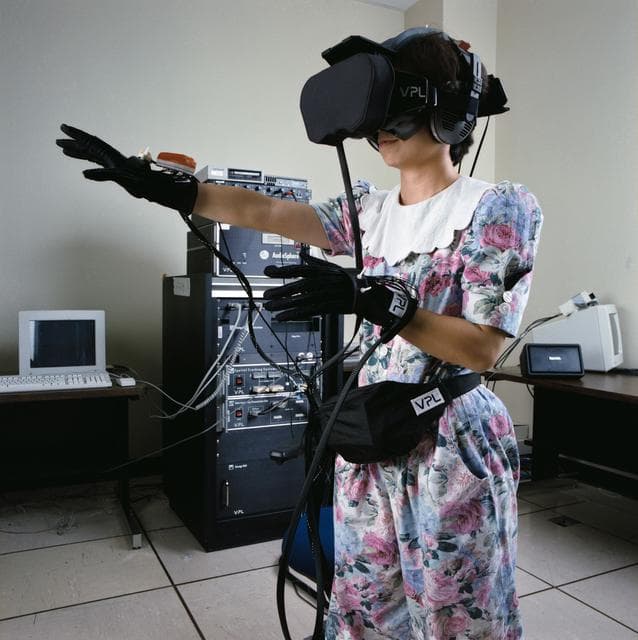 NASA employee utilizes Virtual Reality (VR) equipment