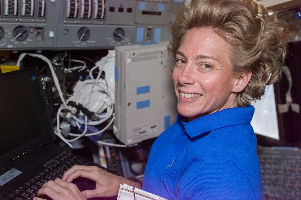 Pilot Still on flight deck with laptop computer