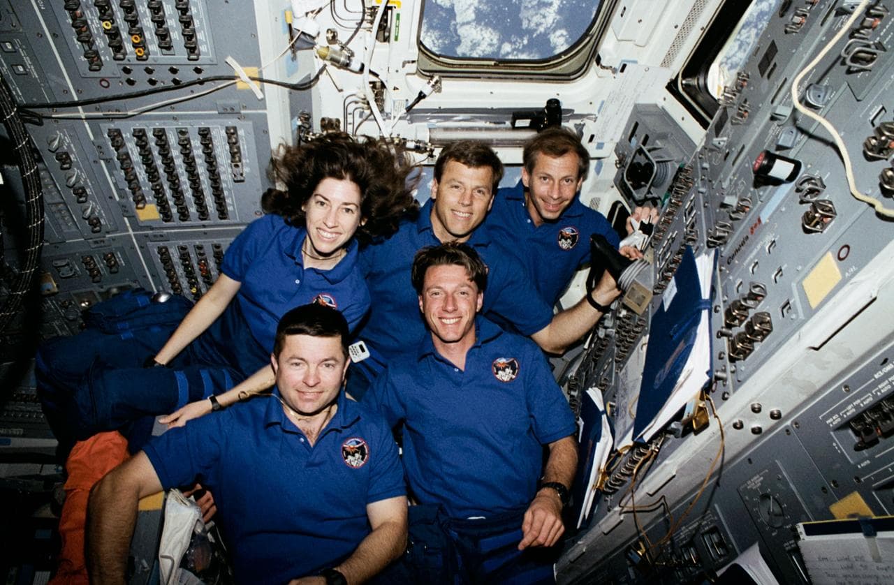 In orbit crew portraits, taken in the aft flight deck.
