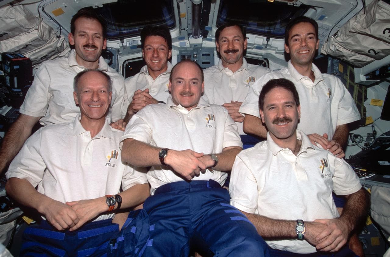 STS-103 inflight crew portrait on the flight deck