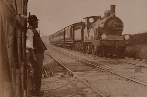 Vintage Railway Album: 18 (detail) - GER train passes level crossing
