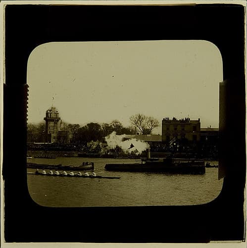 ?Boat Race passing the Bulls Head pub, Barnes ca 1910