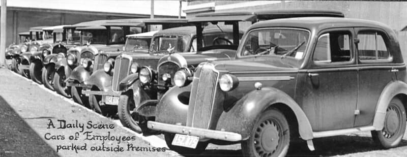 'A Daily Scene, Cars of Employees parked outside Premises' 1938