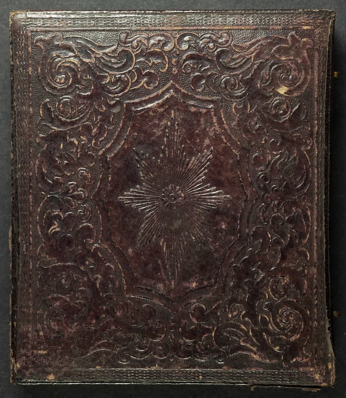 Sixth plate case from ambrotype of a cloaked lady and dog