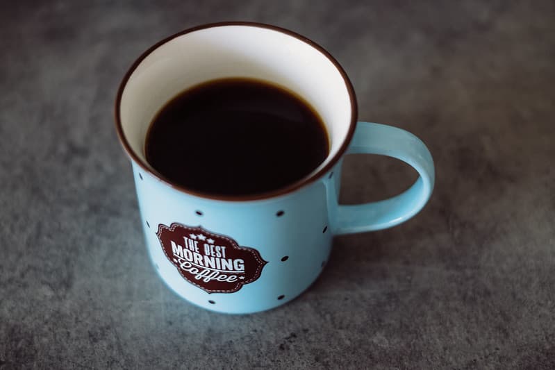 Black coffee in a retro mug