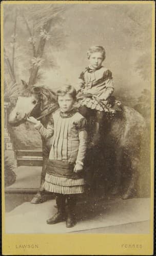 Young children posing in studio with horse, by Lawson, Forres