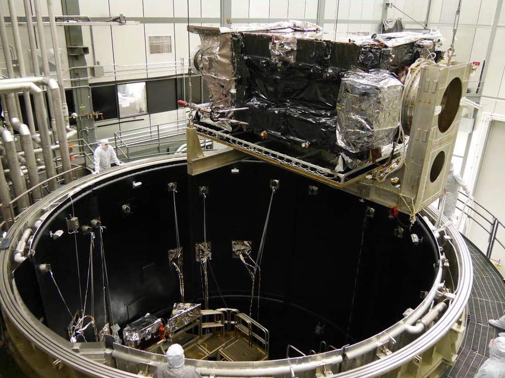 Preparing to Lower the GOES-R Satellite into Thermal Vacuum Chamber