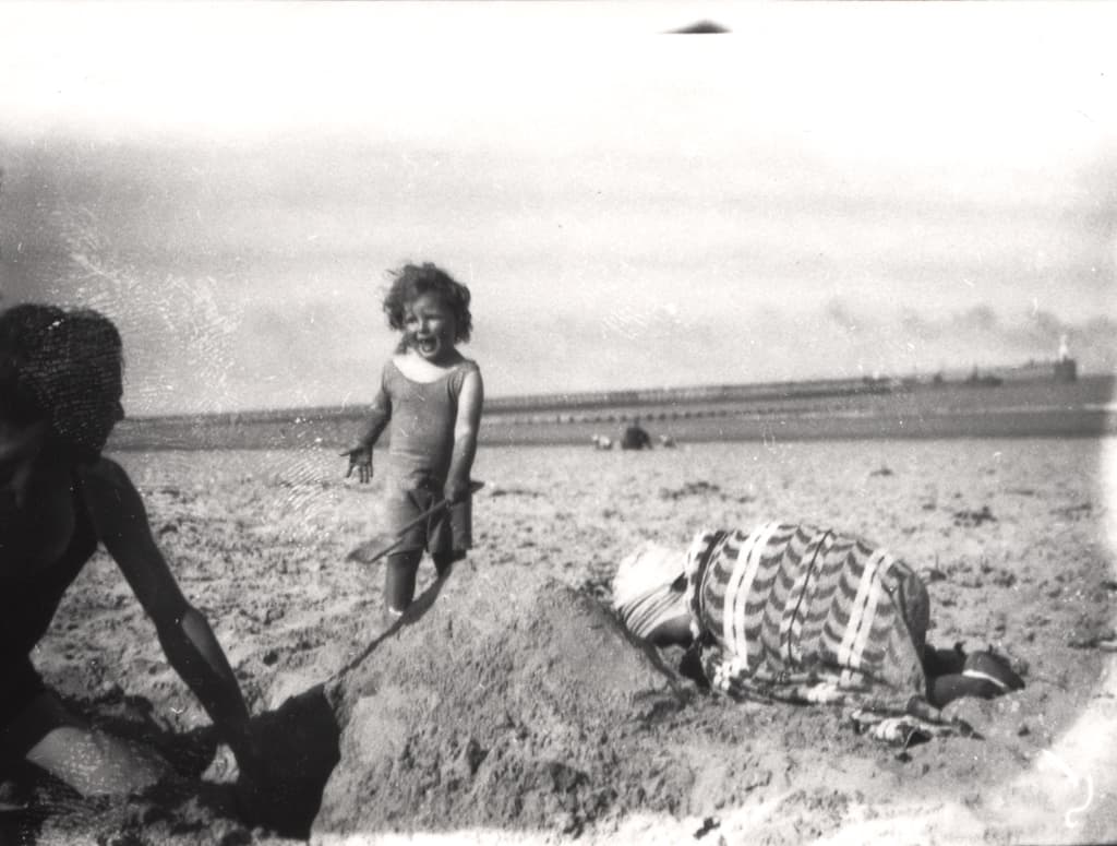 059343:Children playing on a beach Unknown c.1935