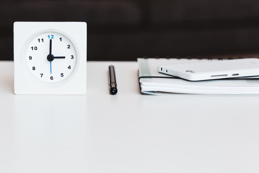 Some accessories on a white desk