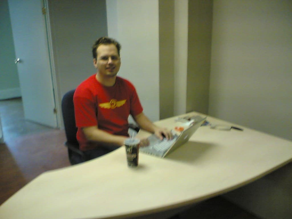 Richard at his spiffy new desk at our spiffy new offices