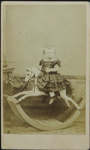 Young child on rocking horse