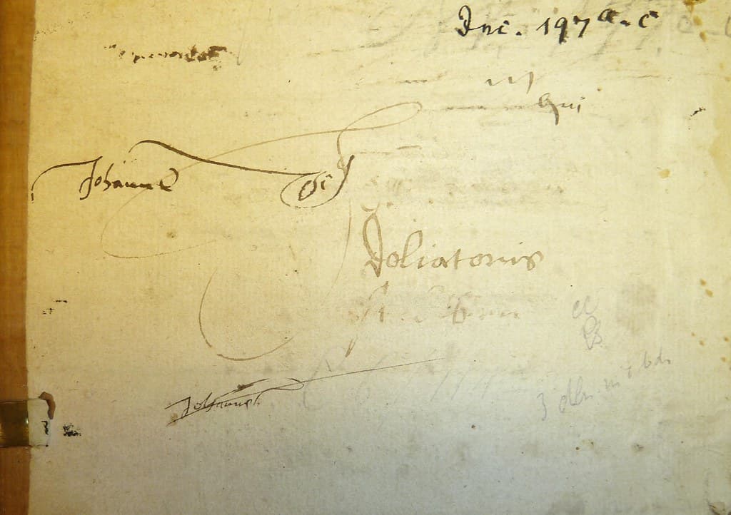 Early pen tests(?); later shelf-mark at head of leaf