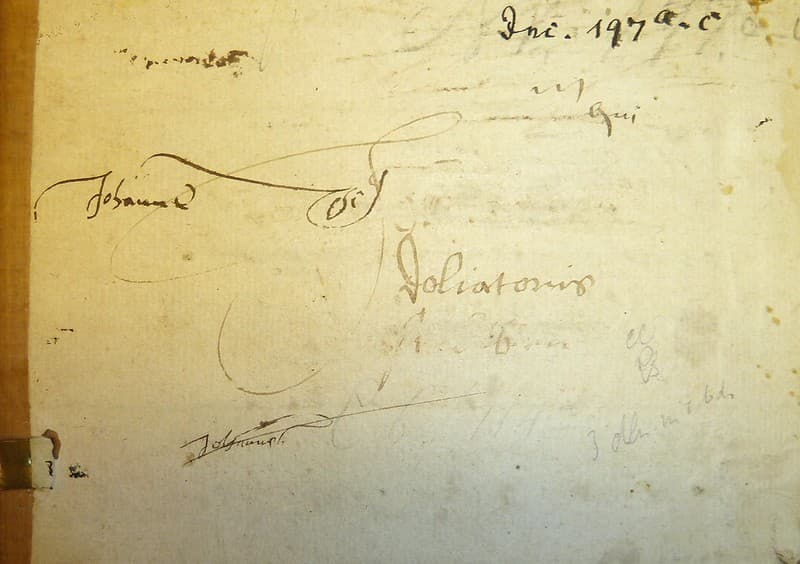 Early pen tests(?); later shelf-mark at head of leaf