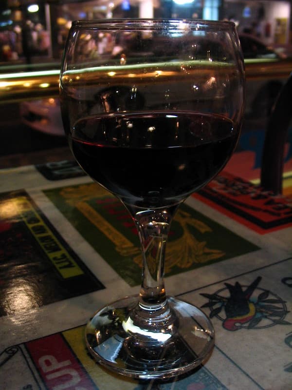 Wine glass in front of window no flash